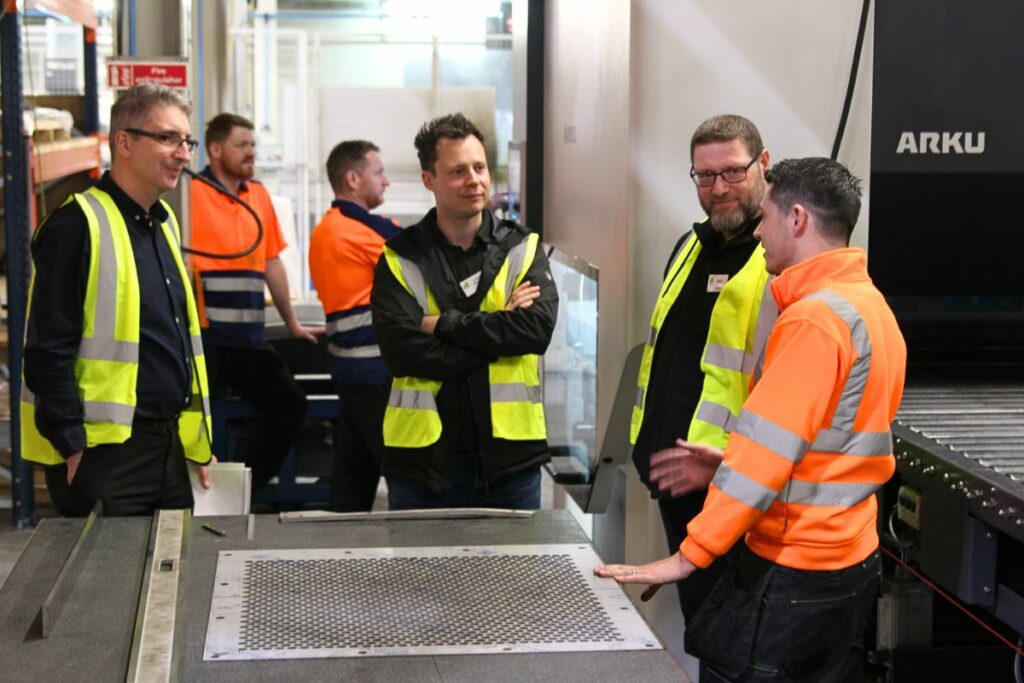Liam Mullinger talks to customers about Wrightforms metal flattening service